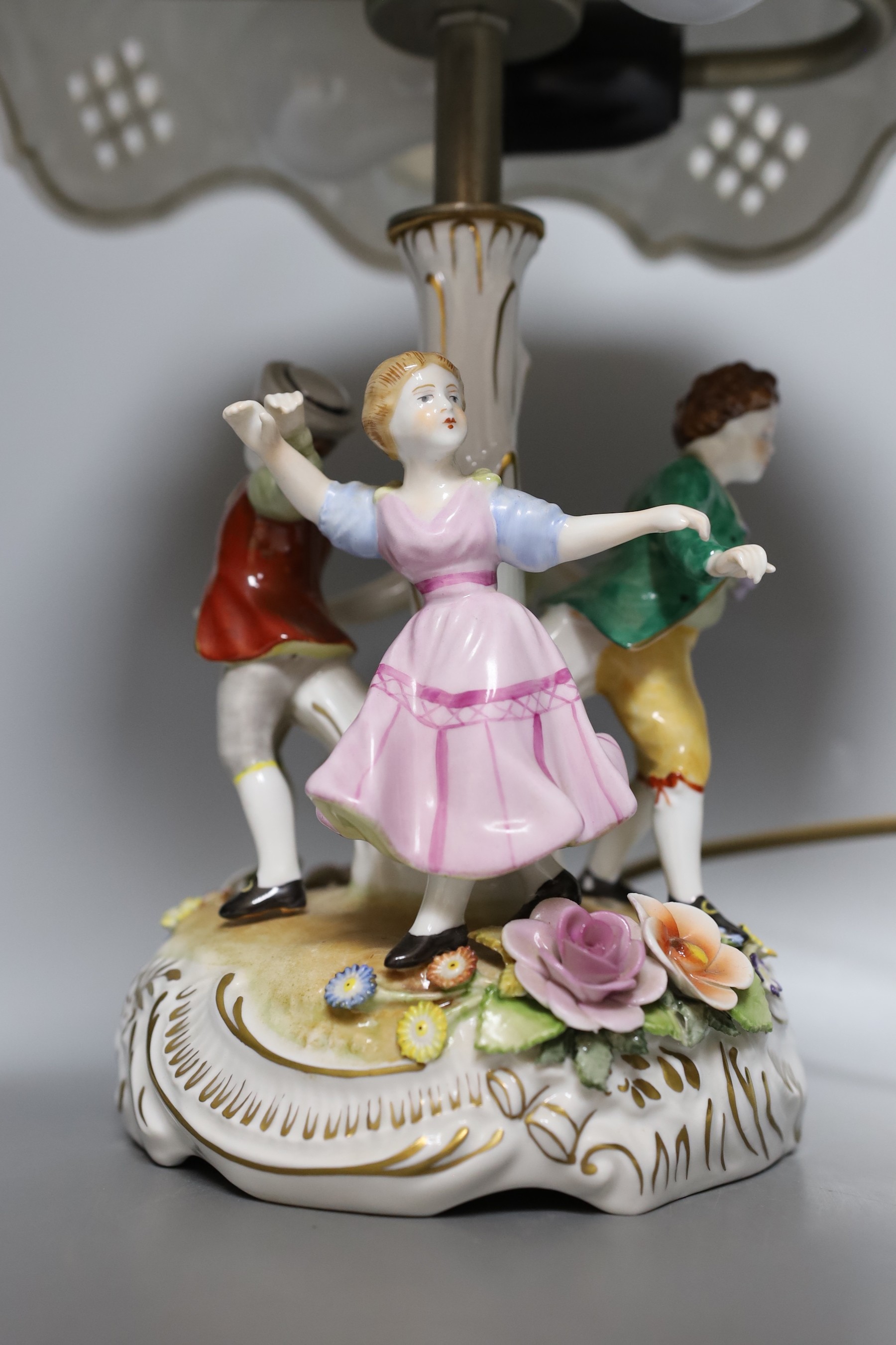 A German porcelain figural lamp with lithophane shade, 40cm